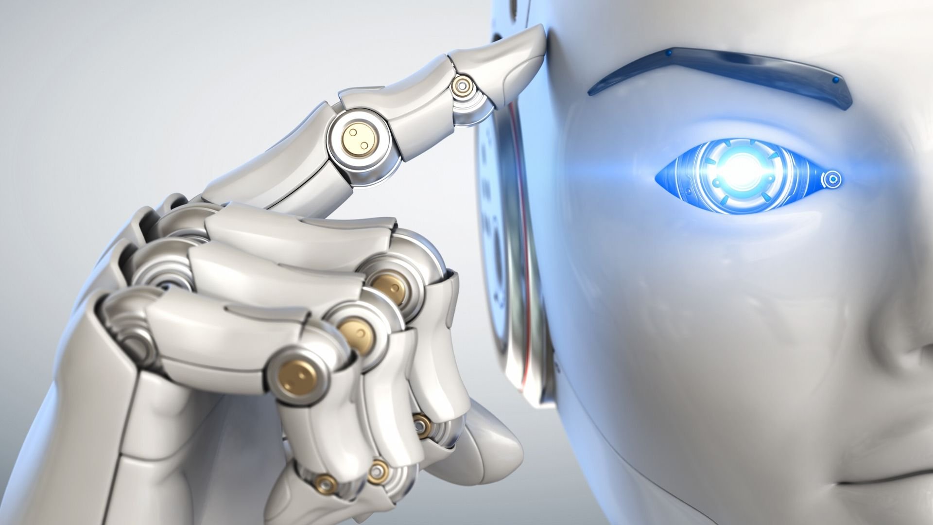 A robot touches its forefinger to its head.